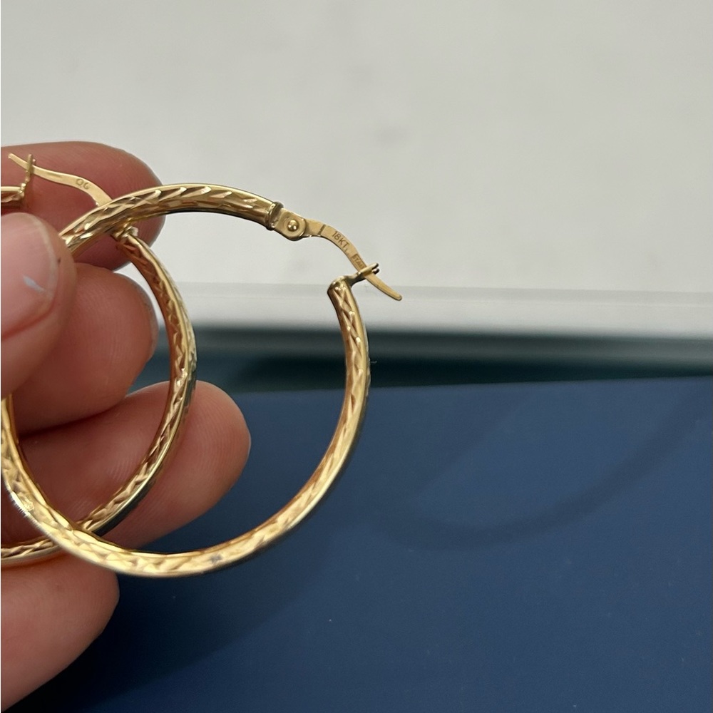 18k gold earrings stamped